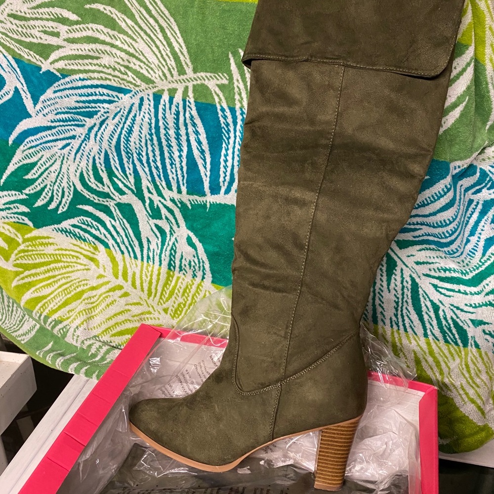 Green over the knee boot.